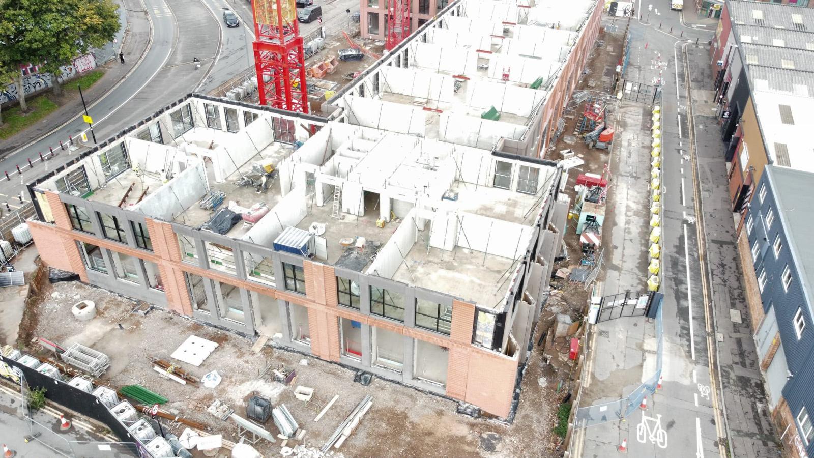 Aerial view showing internal walls and structural progress at Smithfield