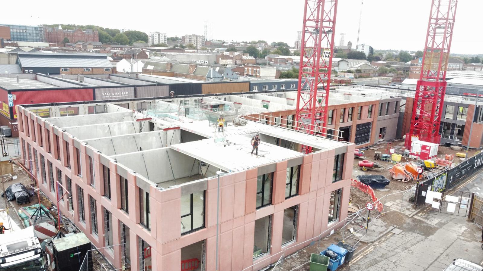 Aerial view of the Smithfield development showing active upper-level construction